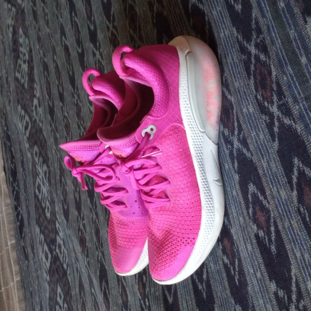 Hot pink Nike Joyride running shoes